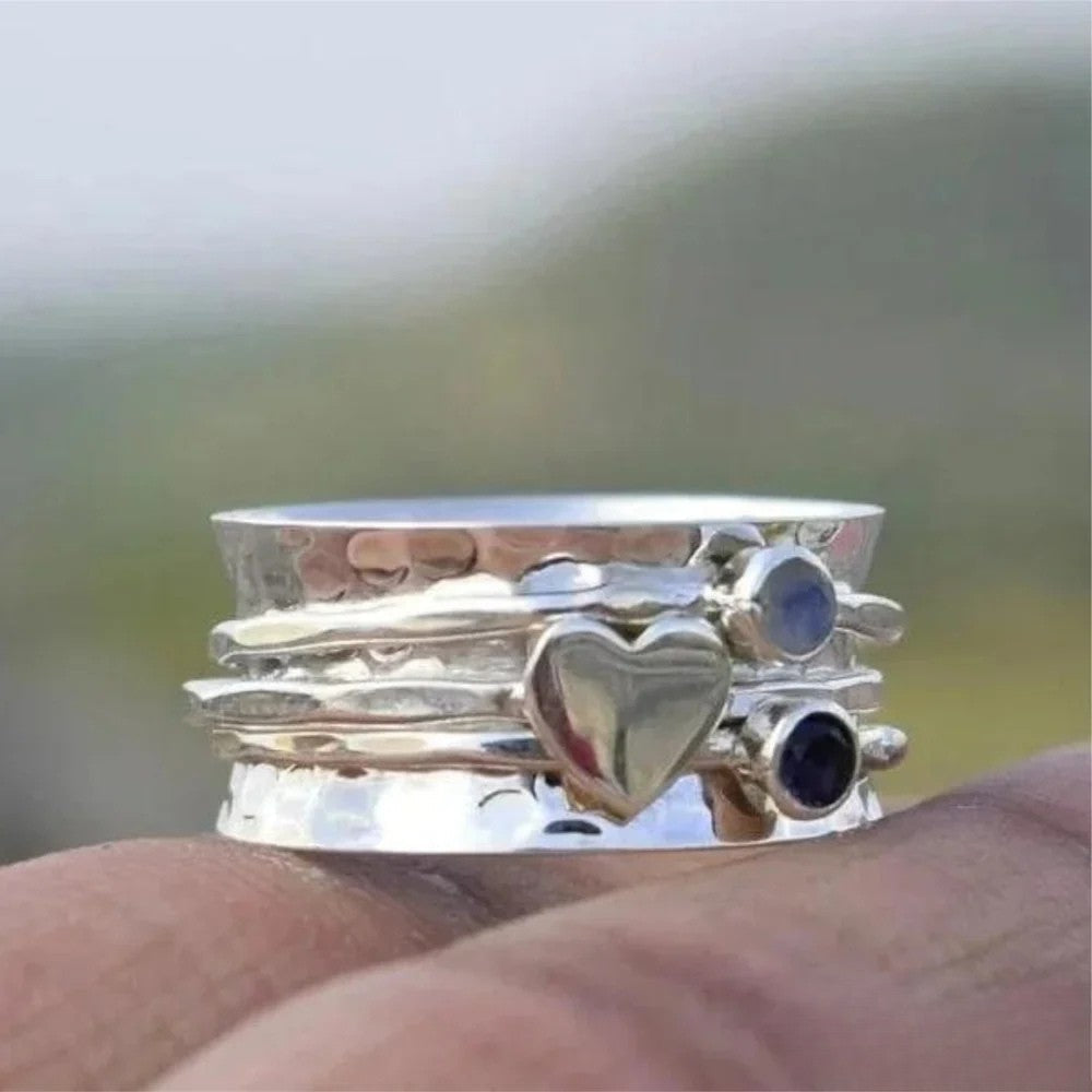 Arla™- Hjerteformet spinner-ring i sølv
